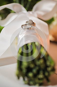 Wedding rings on bouquet