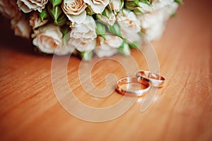 Wedding rings and bouquet