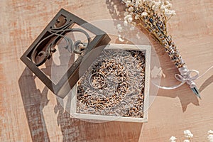 Wedding rings of the bride and groom in a box