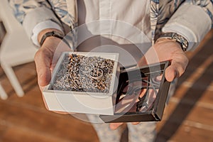 Wedding rings of the bride and groom in a box