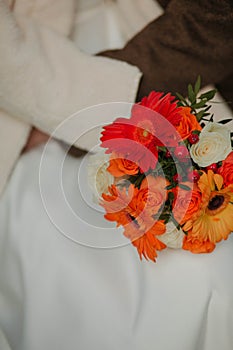 wedding rings of the bride and groom on their hands