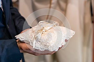 Wedding rings brought to the church for the newlyweds