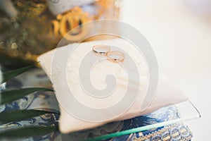 Wedding rings on ceremony at church. Macro.