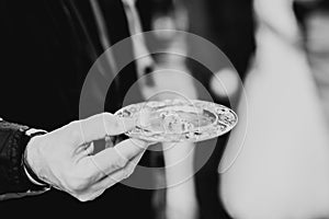 Wedding rings on ceremony at church. Macro.