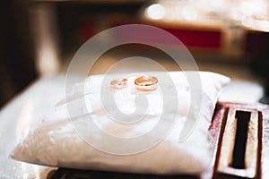 Wedding rings on ceremony at church. Macro.