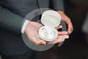 Wedding rings on ceremony at church. Macro.