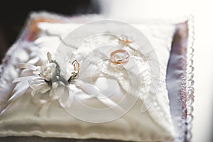 Wedding rings on ceremony at church. Macro.