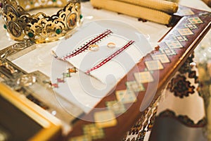 Wedding rings on ceremony at church. Macro.