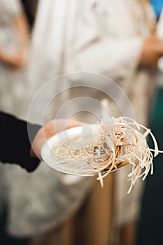 Wedding rings on ceremony at church. Macro.