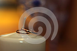 Wedding Rings on a chandle