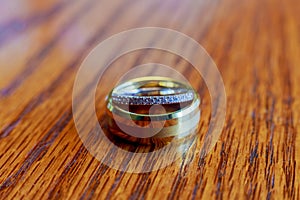 Wedding rings closeup pattern background.