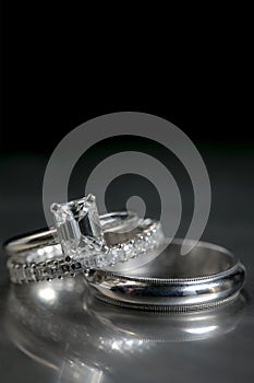 Wedding rings for a couple getting married placed on a display table