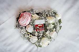 Wedding rings in a floral bouquet