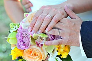 Wedding rings with flowers photo