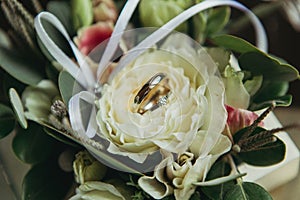 Wedding rings on flowers