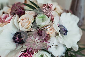 Wedding rings on flowers