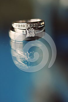 Wedding Rings on Glass Table