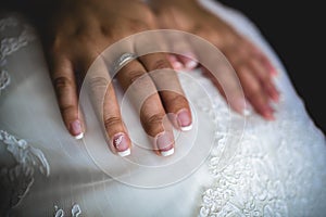 Wedding rings in the hands of a woman in love