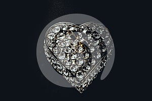 Wedding rings on a heart shaped box