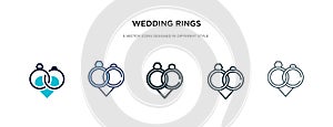 Wedding rings icon in different style vector illustration. two colored and black wedding rings vector icons designed in filled,