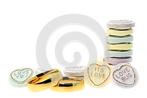 Wedding rings and Loveheart candy sweets photo