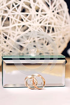 Wedding rings and mirror casket