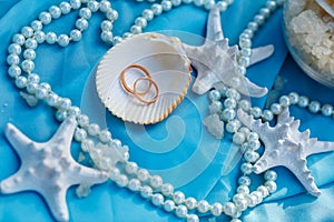 Wedding rings, nautical theme, starfish and pearl