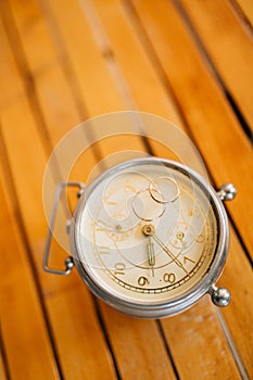 Wedding rings on old mechanical clock