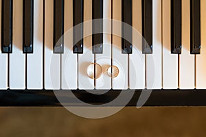 Wedding rings on piano