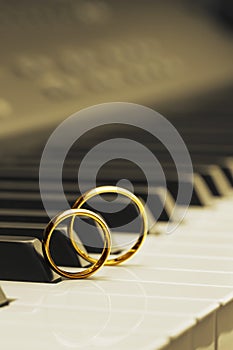 Wedding rings on piano