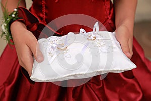 Wedding rings on pillow