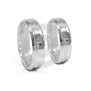 Wedding rings. Stainless steel with zircon. White color background