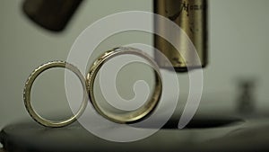 Wedding rings vintage microscope closeup camera slider movement