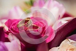 Wedding Rings on wedding bouquet