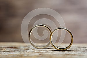 Wedding rings on wood