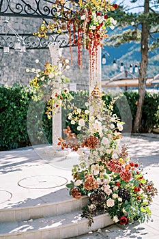 Wedding rotunda column covered with flowers