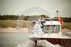 Wedding scene on motorboat