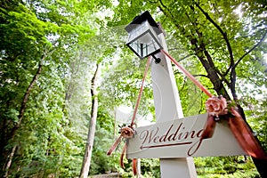 Wedding sign pointing towards ceremony