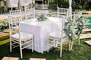 A wedding solemnization table adorned with exquisite floral decorations