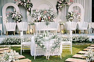 A wedding solemnization table adorned with exquisite floral decorations,