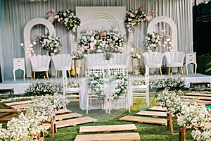 A wedding solemnization table adorned with exquisite floral decorations,