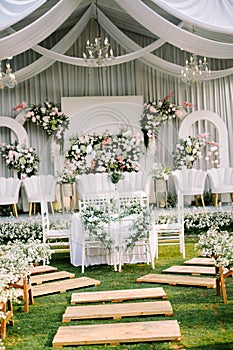 A wedding solemnization table adorned with exquisite floral decorations,