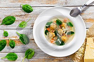 Wedding soup with meatballs, small pasta risini,vegetables