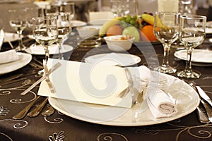 Wedding table arrangement with blank invitation