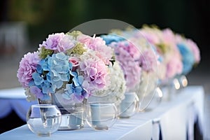 Wedding table decorations in pink and blue. Floral design, special event table set up, wedding outdoor celebration party, banquet