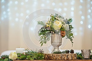 Wedding table with floral arrangement prepared for reception, wedding, birthday or event centerpiece photo