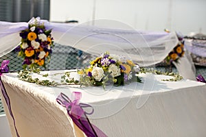 Wedding table flower settings in yacht