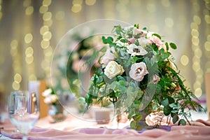 Wedding table with flowers and decorations, wedding centerpiece or event reception