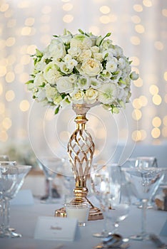 Wedding table with flowers and decorations, wedding centerpiece or event reception