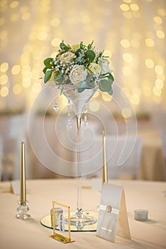 Wedding table with flowers and decorations, wedding centerpiece or event reception